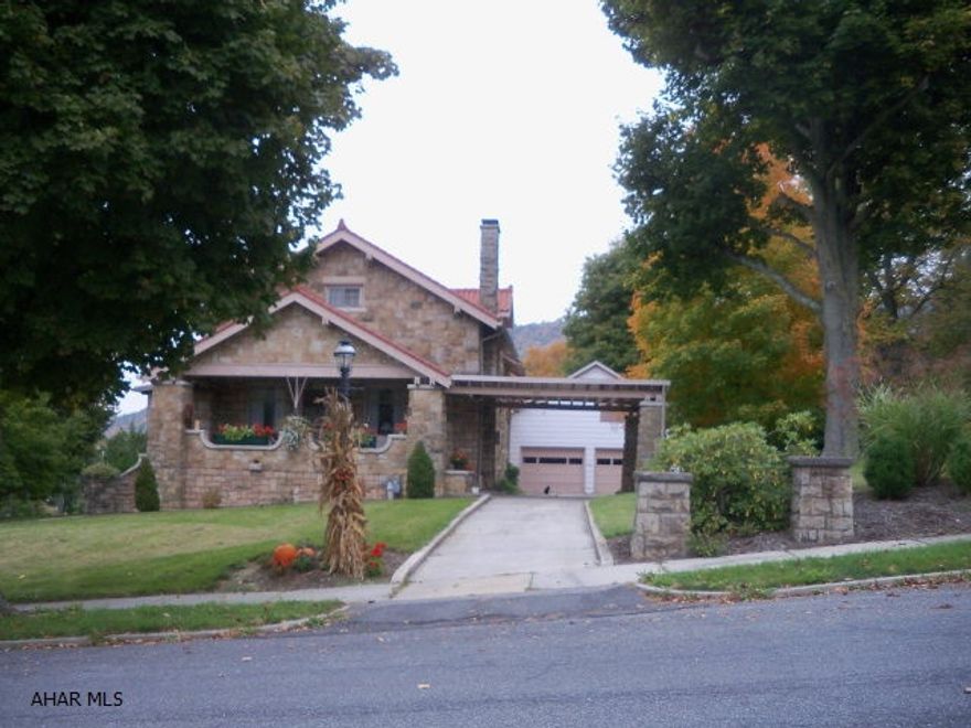 Superb quality built stone home resting at the top of Juliana Heights. Hand cut sandstone walls, architectural tile roof, large .66 acre lot and gorgeous views overlooking Bedford. LR with FP/ Beamed F.R., D.R., Kit w/eat-in area, 4 Beds & 2 Baths. Full partially finished bsmt, high efficiency gas furnace, 2-car garage & 1-car carport.
