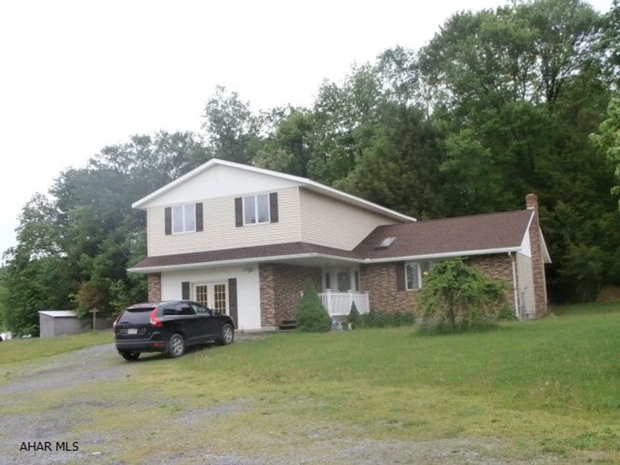 Remote setting with privacy. Split level home with detached 3+ car garage. Well cared for home being sold to settle estate. Could use a first floor room for bedroom.