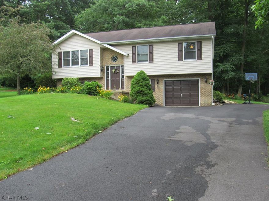 . Location! Location! Location! This well maintained home in the highly sought after Bellwood Antis School District is situated on a cul-de-sac with a semi-private backyard up against the woods. You will enjoy sitting on the large deck having your cup of java as the wild turkey pass through. The home has a new furnace and central air unit. The half bath in basement is plumbed for a shower for the new homeowner. It is also conveniently located 2 miles off the Pinecroft Exit of I99 which makes it easily accessible to commute to State College, Tyrone, Huntingdon and Altoona. It does NOT have HOA fees and the taxes are reasonable. So what are you waiting for, call the Listing agent and set up your personal tour today!