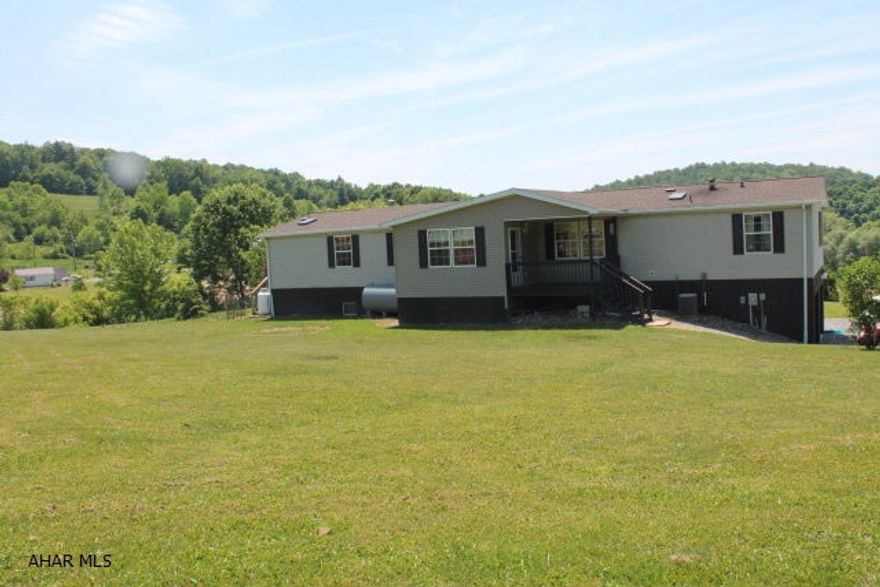 This home has so many upgrades like a new roof w/skylights. Oil Furnace for each level of the house. Large rooms, pool, central air. Don't miss out on this one..