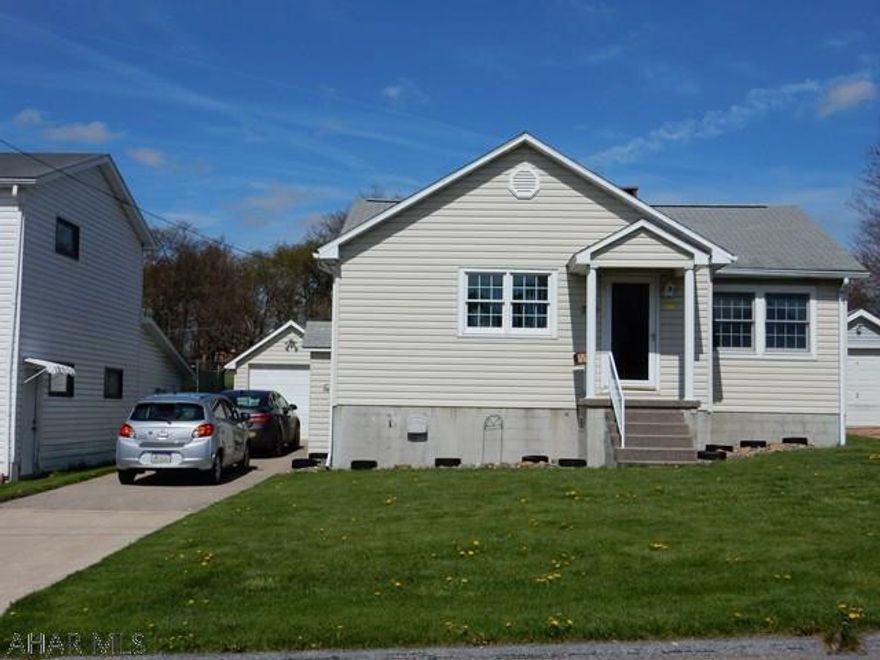 This split-level 2 bedroom (could make 3rd bedroom in lower level) 1&3/4 baths is a must see. Move in ready and a great home for entertaining. It features a wonderful 3 season sun room that lets air in &  bugs out(18.4 x 18.4)! It has a cold closet for your root veggies/sodas/drinks. Parking is good with a 1 car garage and concrete drive-way that fits at least 3 more cars. Get your projects done in the workshop behind the garage and store your seasonal items in the big attic.(Home also has good closet storage) This home was built with great insulation & electric heat--2016 average for the year was $180.89/month. You'll be happy you looked at this home! (The fire place is set up with a propane insert, but could take it back to wood)