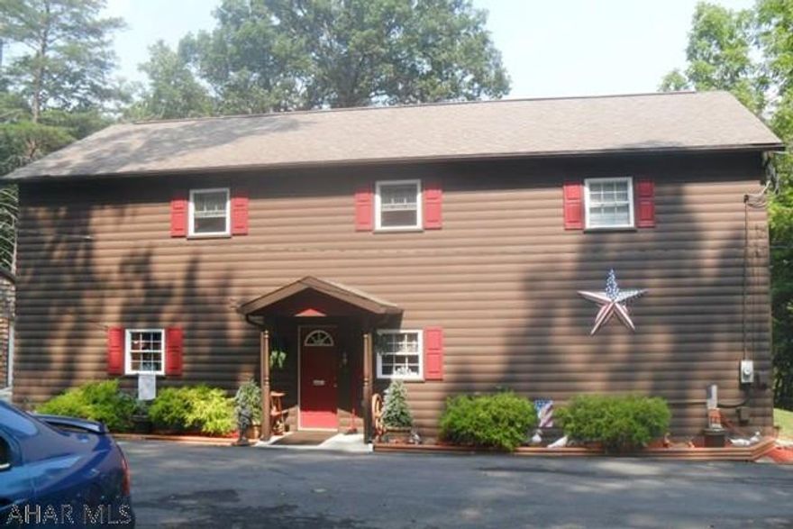 Looking for unique? This gem is move-in ready! Relax in this well maintained two story home tucked away in a waterfront location on the beautiful Juniata River. The main level provides an attractive Great Room boasting a wood-burning fireplace, red oak floors and a kitchen with custom built cabinets. The woodwork in this place has to be seen! The Master Bedroom has a small suite adjoining it with loads of space in two walk-in closets. There is a Solarium on the 2nd floor that is an appealing light filled space to relax and take in the scenic views. Come take a look at this lovely, spacious 4 BR, 2 BA home. Because this home is located at the very end of the street, it has a private feel. This could be your next move!  Flooding has not been a concern because of the way the river flows.