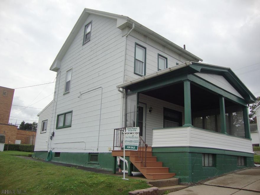 Well maintained city home with 2 bedrooms and 1.5 baths.  Attic could easily be converted into a 3rd bedroom.  Totally updated electric.  Thermopane windows throughout.  Freshly painted and it's move in ready condition.  Perfect starter home or investment property.  Nice front porch with beveled glass insert above front window.   There's also an extra lot beside the home that is included.