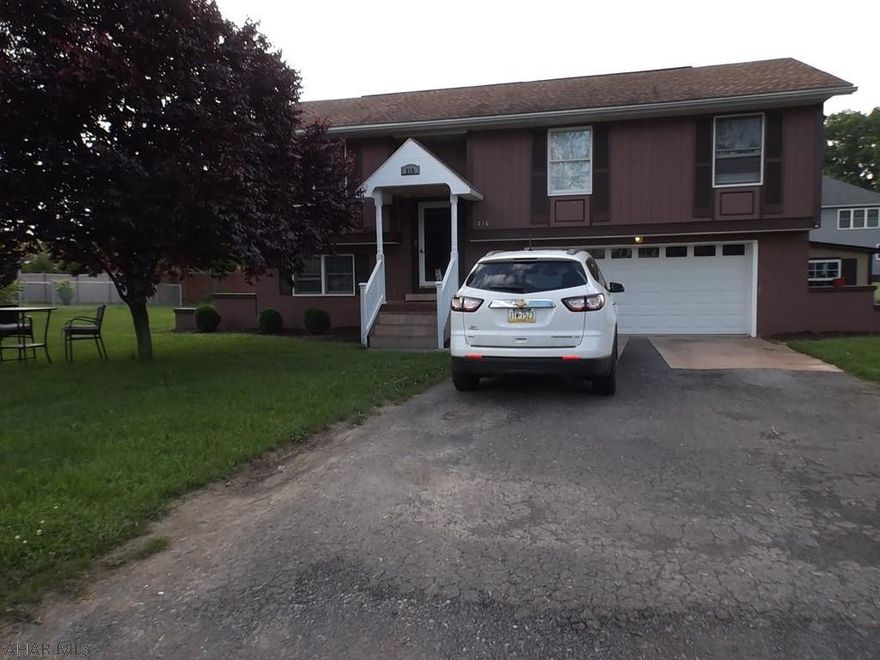 Immaculate split entry in Hollidaysburg.  Large deck off dining area.  Plenty of cupboards and counterspace in the kitchen and includes newer refrigerator, range, and dishwasher.  Master bath and full bath on main level.  Propane fireplace in living room with television above the mantel.  Large family room downstairs along with 3/4 bath and laundry area that includes the washer and dryer.  Entrance to 2 car garage with auto opener.  14 x 8 shed and firepit outside.