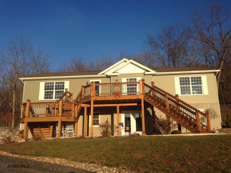 Beautiful new build sits atop Bedford valley on 4 acres of land. This 3 bed 3 full bath home is complete with an open plan living, kitchen and dining area with a finished basement. Living and dining area include gas fireplace, custom windows, and expansive mountain views. Kitchen has unique features such as a built-in foldable electronic charging station, large island and stainless steel appliances. Bedrooms have large closets with the master including a walk-in and full bath. Full master bath has a large garden tub and separate stall shower. A car enthusiasts dream with 1 attached garage, large shed, and detached 3 car garage. Finished basement provides an entire additional living space.