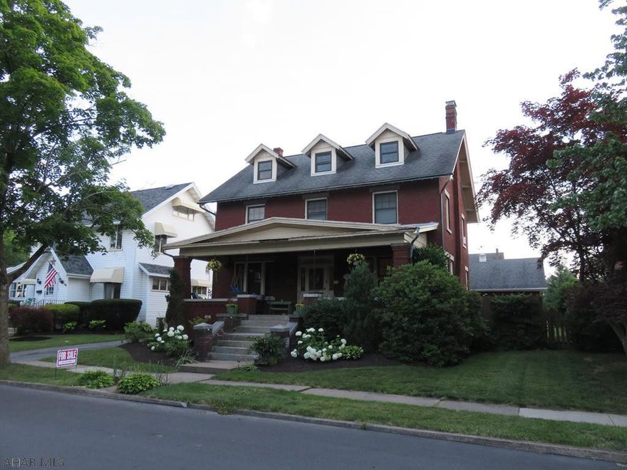 Beautiful classic brick in the borough with everything done for you! Huge living room with wood burning fireplace, new carpet, new kitchen with tile floor and granite counter tops, new appliances and recessed lighting. Hardwood floors in entry and dining room. Beautiful french doors to dining room. Second floor has 3 bedrooms, new bathroom with ship lap and double vanities. Sun room on second floor converted to laundry. 2 Extra bedrooms on 3rd floor. Perfect for home office. Private back yard with patio and fenced. Detached garage with new doors.