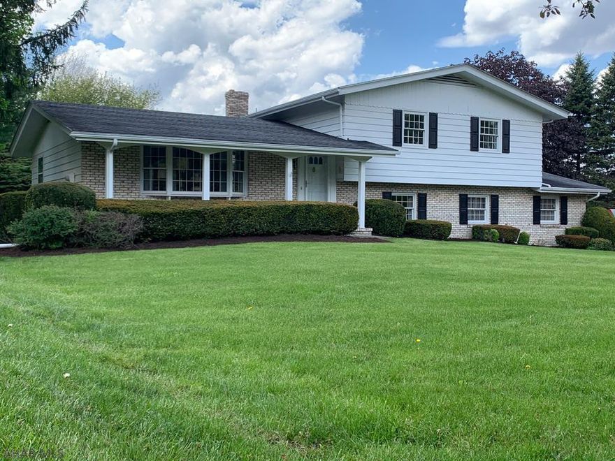 This home was custom built and built to last! So close to everything, but so secluded on almost 1/2 an acre! Gorgeous landscaping, sturdy, and spacious- with an amazing back patio and back yard! You'll never feel crowded with its separate dining room, spacious living room and 2.5 bathrooms! This home has plenty of natural light, and a wet bar and bonus room, perfect for entertaining. All 3 bedrooms are large with gorgeous hardwood flooring. Schedule your showing today! Motivated seller, bring all offers!