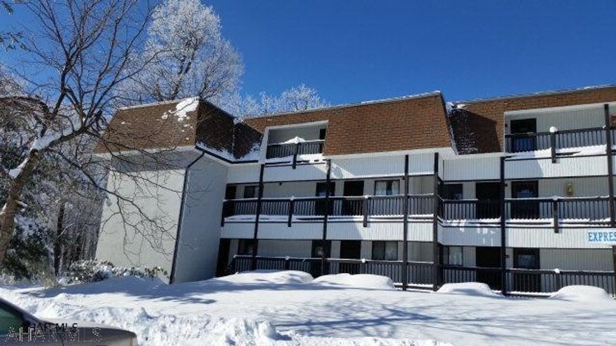 Nice 2nd-floor 2-bedroom 2-bath condo with Laundry Hookup.  Wet bar off Living Room.  Electric system is breakers.  Fully furnished.  Located across from rental office.  Enjoy the amenities of this 4-season resort.  $256.00 monthly association fee includes outside maintenance, tennis, hot tub, outdoor pool & trash removal.  (Skiing & golf for a fee).  J-449