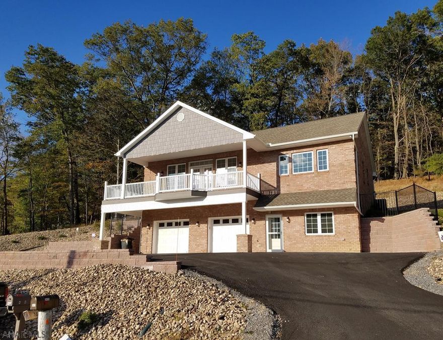 New Construction!!  Own this beautifully crafted 3 bedroom, 3 bath home with upgraded everything!  Hardwood floors throughout, incredible open layout at main floor and kitchen.  Take in the peaceful views from the wrap around covered composite balcony or enjoy the silence on the covered patio located off the back french doors!  This is truly the custom home you have been looking for.