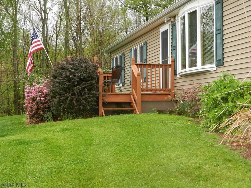 Nice ranch-style home situated on one acre of land. Hardwood and tile floors throughout the main level. Lots of closet/storage. Partially finished walkout basement with family room, and possible 4th bedroom. Wooden patio off the back, with a raised, covered area for outdoor dining. Large storage shed and the views of the valley and the mountains behind are fantastic. In addition, the home is only 15 minutes from Blue Knob. This would be a second home great getaway from your city home.