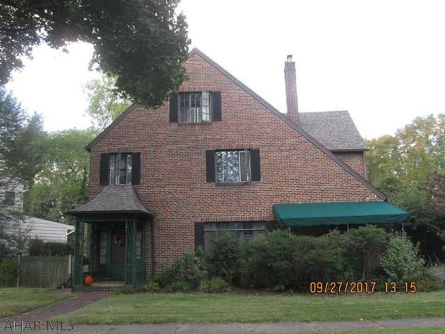 This classic three story brick has so much charm and amenities to offer. This is a true home with a feel  of elegance but yet so inviting.  So inviting in fact there is a guest suite or master suite on the 3rd floor.  All the bedrooms have walk in closets and tons of other storage in this house. Hardwood floors thru out, crown molding, mahogany doors, the woodwork is stunning. There are 2 fireplaces, a gas fire one in the breakfast room and a wood fired one in the massive living room.  The laundry area could be moved to the first floor.. The outside is landscaped with a small side yard that is fenced, open back yard with deck which has an awning and a quaint little patio off the breakfast room through the french doors.. The utility costs are low and a Home Warranty is being offered.