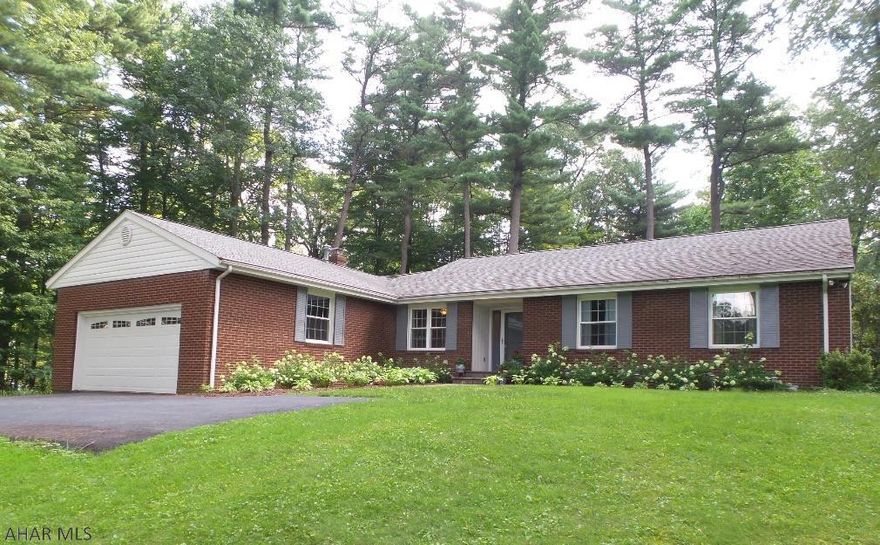 This amazing, spacious ranch home offers one floor living and is completely updated!  Mature trees and beautiful landscaping.  The paved drive leads right into an over sized 2 car garage.  Enjoy entertaining using the open kitchen and family room featuring a brick fireplace.  Relax in the refreshing screened room that overlooks a 20x14 open patio that overlooks the flat yard.  The Master bedroom suite has an abundance of closet space and a beautifully updated bath.