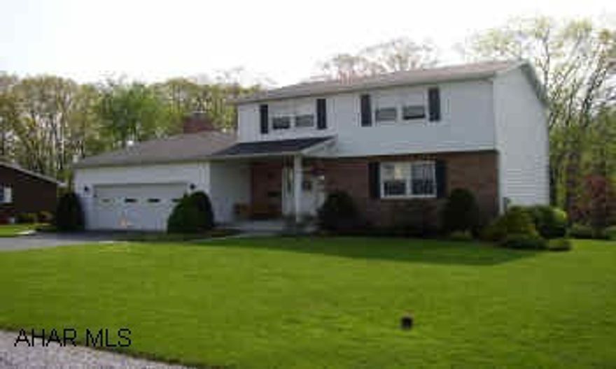 IMMACULATE 3 BEDROOM, 2.5 BATH HOME ON A BEAUTIFUL WOODED LOT. LOVELY ENCLOSED BACK PORCH.