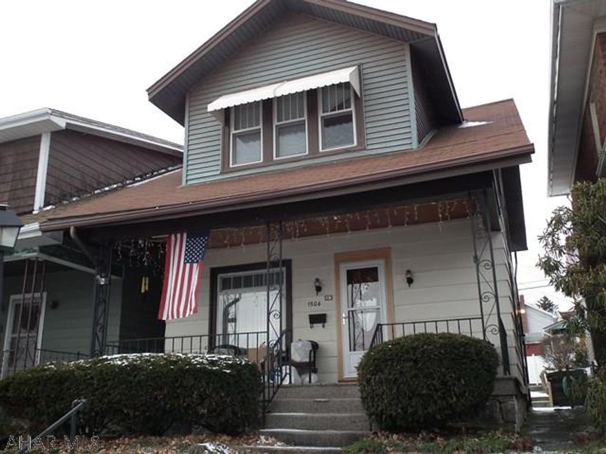 A home filled with Nostalgia waiting for your touch! 3 bedroom 1 1/2 baths, Rounded archways with sizable living room and dining room,  kitchen with plenty of cabinets, bonus room off kitchen and half bath. 2nd floor full bath is large with vanity area, 2 hall closets and walk up attic for storage. Off street parking and additional lot. Seller will give 3% Sellers Assist.  SELLER WILL CONSIDER REASONABLE OFFER.