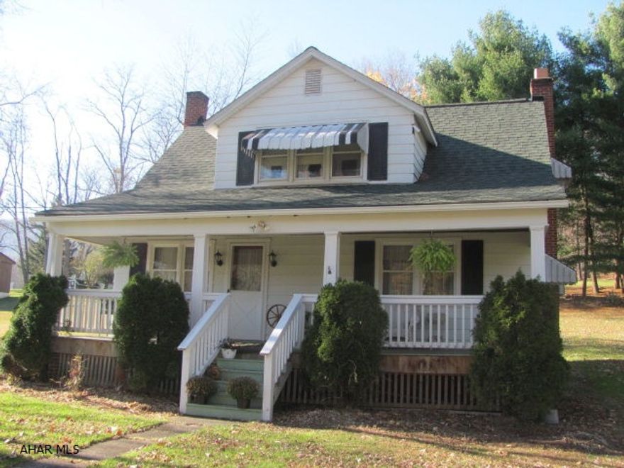 Cozy Cape Cod situated on a park like setting located minutes from Raystown Lake and resort. Home has large brick fireplace, solid birch cabinets and enclosed three seasons room. This property would be a perfect starter home or vacation home with plenty of RV parking areas.