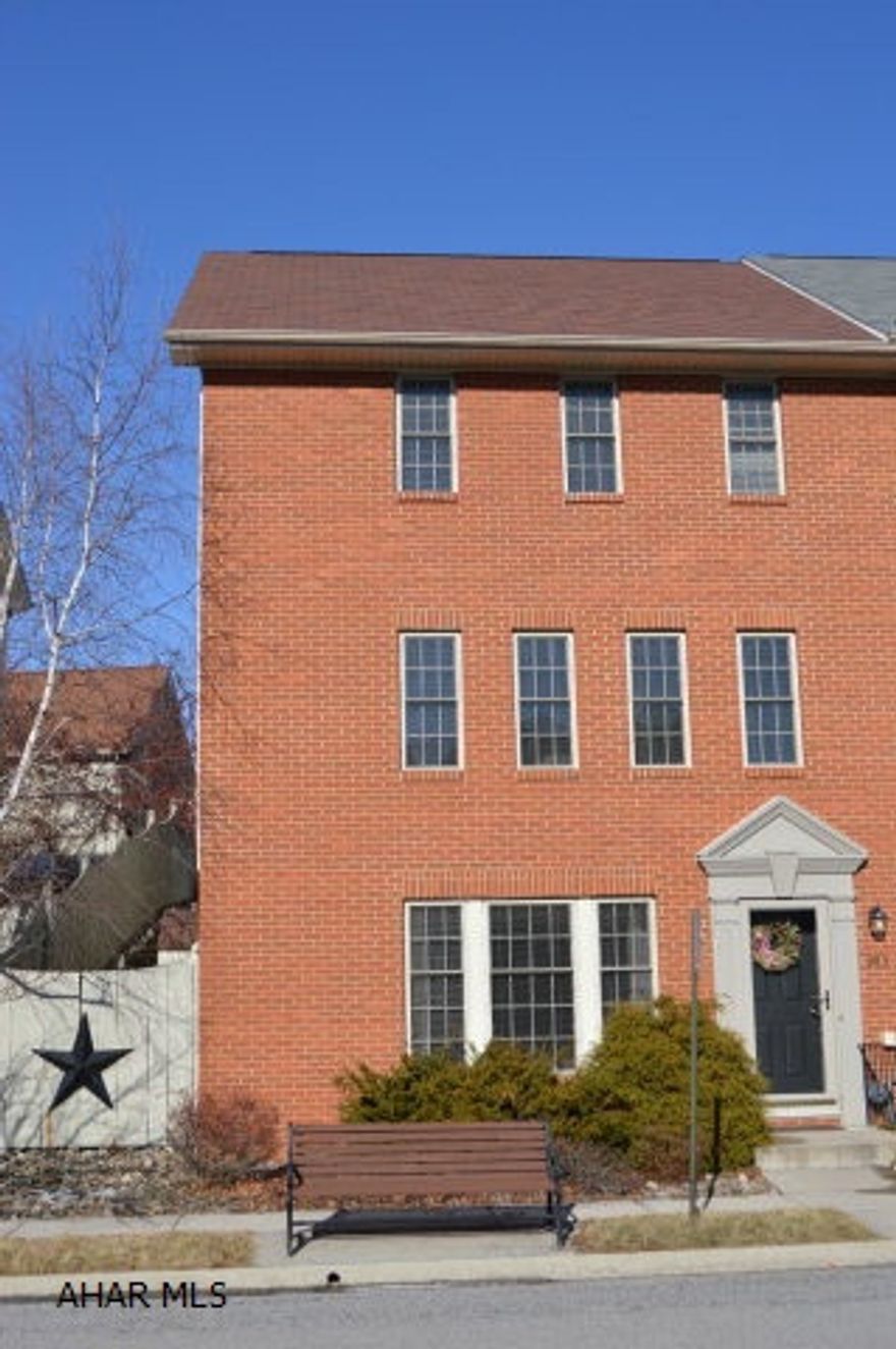 Spectacular updated 3 story townhome not only offers a spacious and well maintained living space but is also located in a perfect area within Hollidaysburg. This move in ready townhome is a coveted end unit in Sweet Cherry Court. Oversized and spacious layout makes this townhouse one of the largest on Sweet Cherry Court.The first floor offers a cozy area with a family room, gas fireplace, hardwood floors, full bathroom, laundry room and storage. All new stainless steel appliances. 3 Bdrms, 2 full baths, 1 Half Bath, 2 car detached Garage, large walk in closet in master bdrm and cherry hrdwd floors and cabinets. Beautiful mountain views from the upper open deck and newly built screened in porch. Beautifully landscaped front and back.
