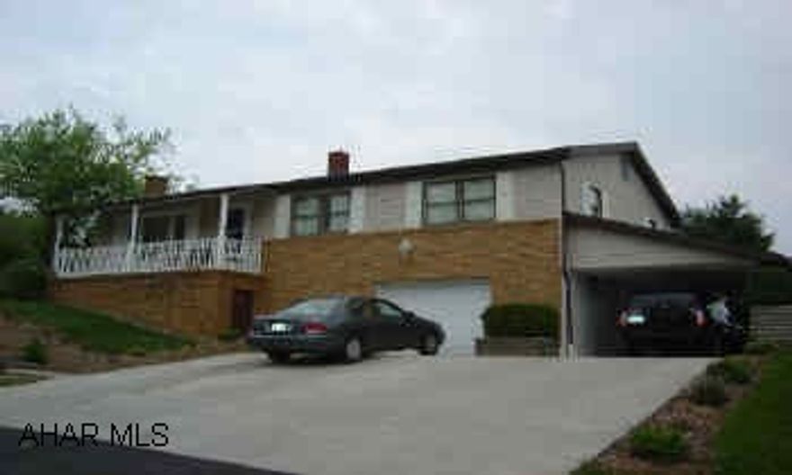 Mint condition, new kitchen, new bathroom, hardwood floors, and beautiful landscaped lot. Garage and carport.