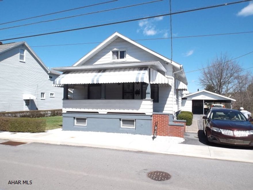 Newer windows. Furnace 2001, central air, gas lin in basement for extra stove. 2 car car port, fence across back of home.