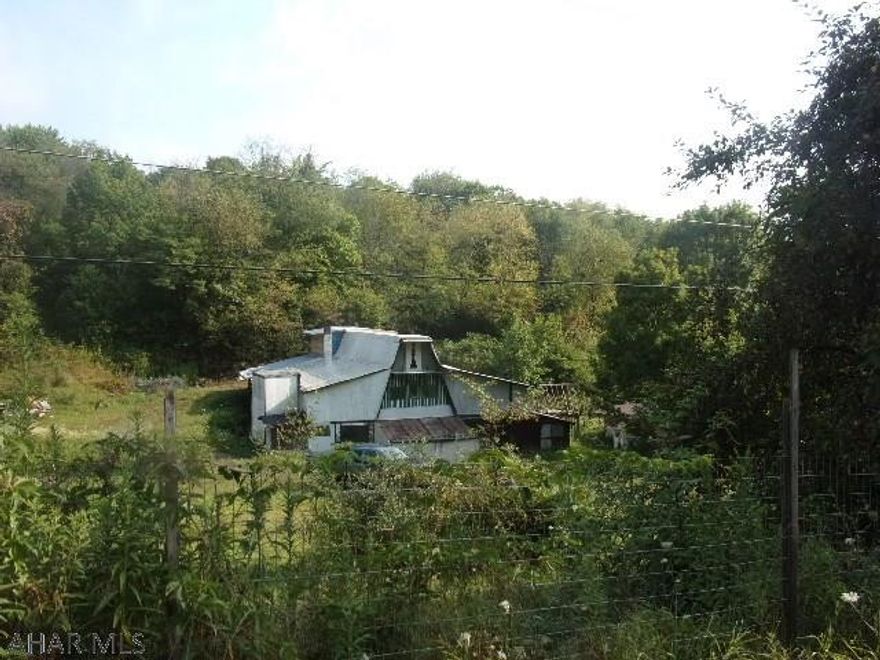 2 story East Freedom home on 2.76 acres. Home needs major TLC and should possibly be razed, but good land value with loads of possibilities. Barn also on property.