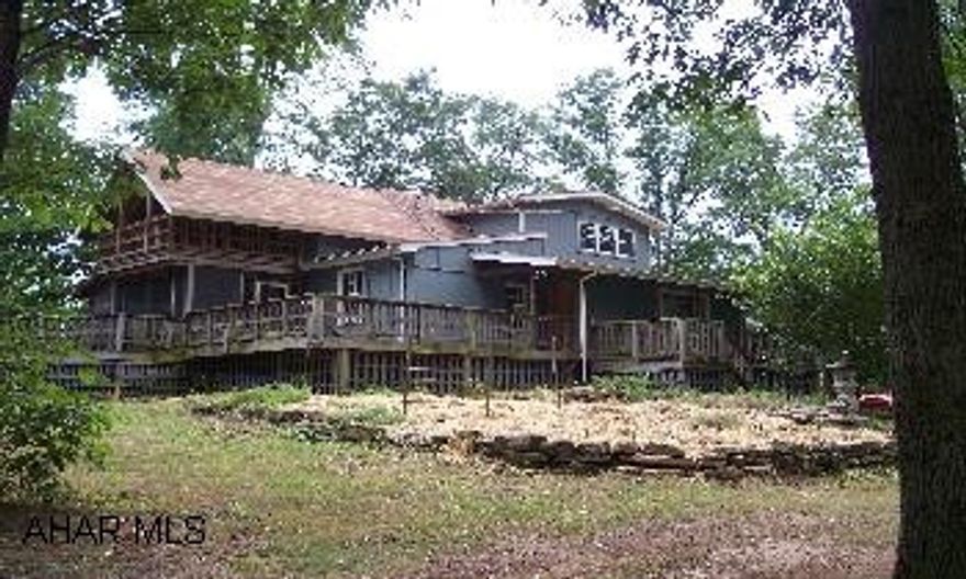 This home is located with in 20 minutes of Lake Raystown and only two minutes from the Juniata River.  First floor bedroom with handicap bath, wrap around deck with part being screened in. above ground pool first floor laundry, ceramic tile and hardwood floors.  28 x 30 barn great for horses.