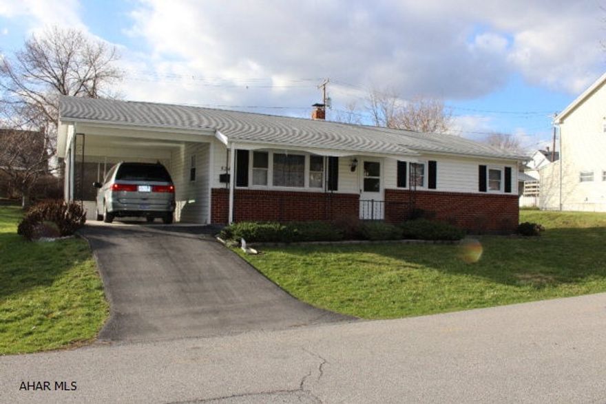 Extremely well maintained ranch home in East End.  Low maintenance vinyl and brick exterior with a covered carport and driveway.  Bonus workshop with double city lot.  Wait until the flowers bloom - bright and colorful landscaping on a quiet street.  Very nice carpeting over hardwood floors. Kitchen and bath have had updates - move in ready condition. New thermo pane windows.  Central Air and newer Hot water boiler with full unfinished basement.