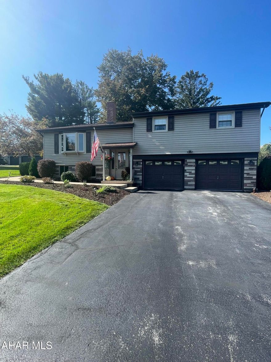 One-of-a-kind in Logan Township! Meticulously cared for home with amazing detached 3 car garage and man cave. As you enter this multi-level home, the first level offers a large 17x23 living room with a wood fireplace. The open concept kitchen and dining room area with radiant flooring, brick backsplash, a lot of cabinets including two lazy susans and pull-out drawers. Enjoy your morning coffee in the four-season room (heated and a/c). The upper level is where you will find the two full baths and three bedrooms. The master bedroom has a 9x9 walk in closet including built in ironing board. The master bathroom has shower with seat, jacuzzi tub and double sinks. Lower level offers bonus room that would make a great play area/office. Utility area with additional storage helves and four zone heating hot water boiler with the fifth zone heating the hot water tank. The large, finished area will make a great family room (movie/TV area, pool table, options are endless!). The workshop/craft area with 1/2 bath completes the lower level and leads you back to the 23x22 integral garage. The detached garage is 42x29 includes three 10x8 doors, a hoist to help with your repairs, with pull down steps and full storage above. There is running hot/cold water and 25' countertop with four outlets perfect for entertaining, cabinets for tons of storage and did I mention radiant heated floors? The man cave 18x23 room attached to the garage is fully carpeted with gas fireplace and TV. This garage alone would be the perfect space to host holidays or super bowl parties! There is an above ground pool with large deck, shed and firepit area. This is a must-see property!