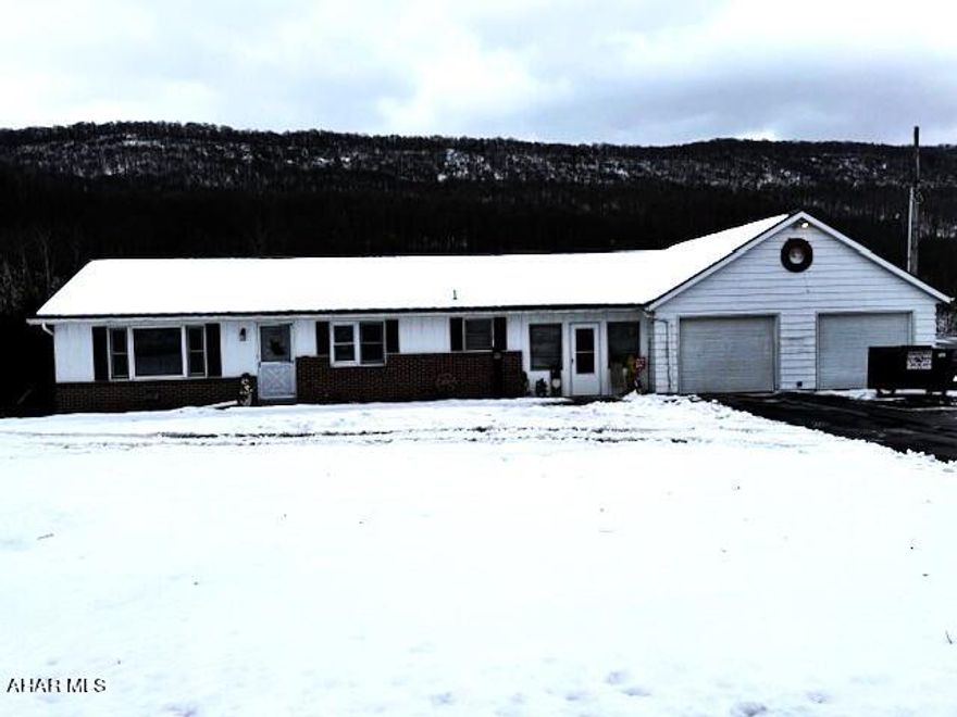 Step into the charm of this two-bedroom, 1 1/2 bath ranch on 1.498 acres - a canvas for your creative flair! Enjoy sunny vibes by your above-ground pool, perfect for spontaneous pool parties. The attached garage has updated electric and added insulation. Modern living unfolds with almost all newer waterlines in the house,  newer pressure tank, water softener, hot water heater, and updated bathrooms. The breezeway adds a delightful connection between spaces. Outside, the concrete patio beckons for memorable gatherings overlooking the fantastic backyard. Your dream home is an open canvas, ready for your unique touch!