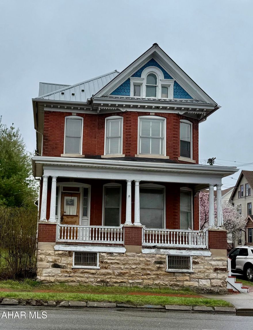 Stately 3 story home in Altoona.  Hardwood Floors have been redone.  New floor in bedroom 2.  1ST floor has  Kitchen with nook, plus dining room and living room,  1/2 bath, and 2nd set of stairs to 2nd floor.  3 large bedrooms , sewing room and full bath on 2nd level.  steps lead to the 3rd level.  The outside makes this home special with brick patio, totally refurbished garage with covered porch.  Yard is fenced. Side yard goes with this property.  Looking for a quick close, this would be it!!