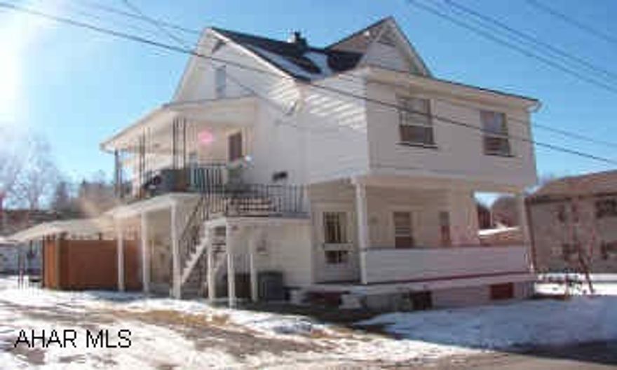 2 story duplex w/detached 2 car garage. 5 city lots.  2 story duplex w/detached 2 car garage. 5 city lots. Can be converted to a one family home. Some appliances and hot tub negotiable. Owner lives on first floor.