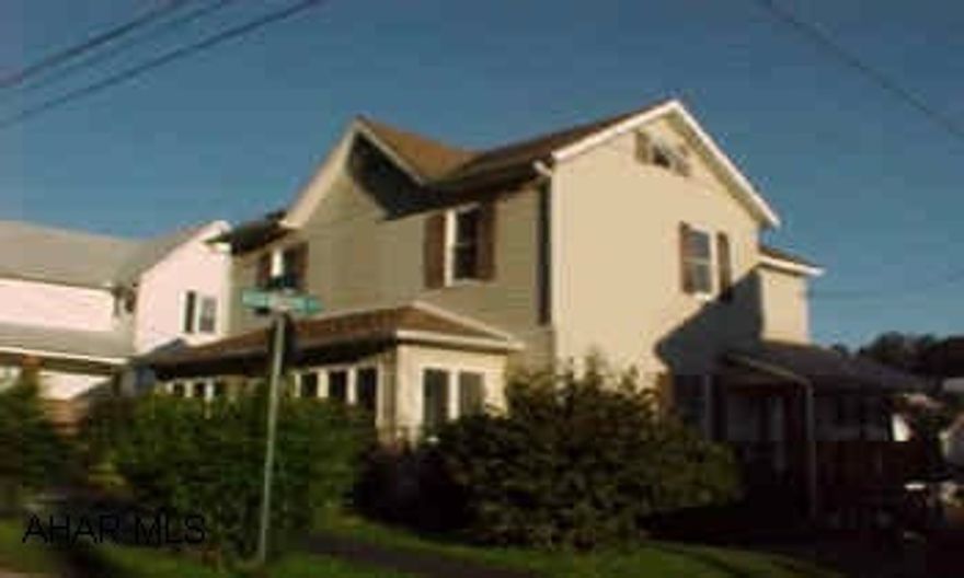 2-story, vinyl sided 3-BR, 1.5-BA home.  Detached garage/carport. Shingle roof is 25 years of age and needs replaced. Basement can get damp or puddling in heavy rains.