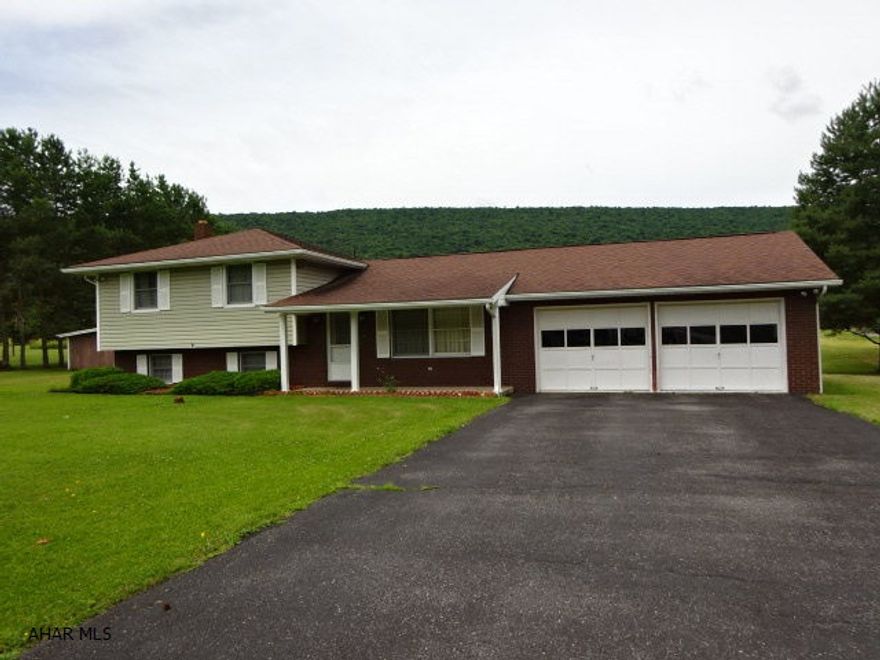 Country Living at it's best. Nice Split Level on a  level .85 acre lot. 3 Bedrooms, 1.5 bath. Electric BB and Oil FWA heat. Central Air. Brick/Vinyl maintenance free exterior. Large 2 car att. garage. Very nice neighborhood. Add your personal touch to make this the home you've been looking for.2017 estimated taxes off the new reassessment notice are $1947. Appliances are not warranted.