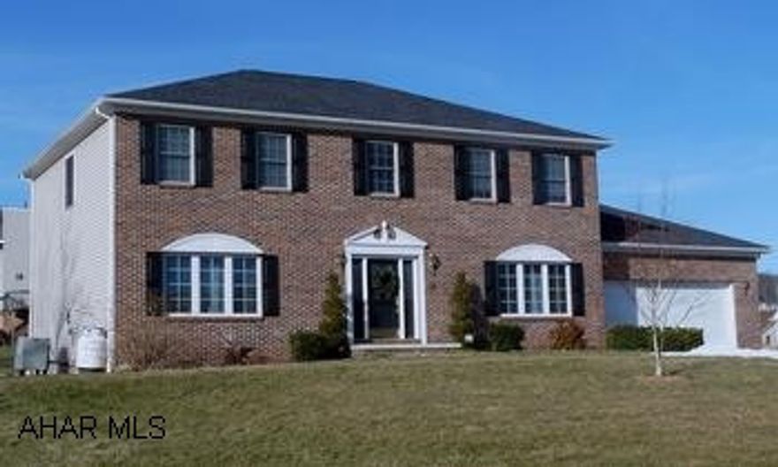 Custom 2-story 3BR/2 1/2 BA brick and vinyl home close to hospital and shopping in newer development. Custom built 2-story 3BR/2 1/2 BA brick and vinyl home features elegant open foyer, formal dining room, living room / gas fireplace, custom kitchen / granite countertops / birch cabinets, breakfast nook w/bay window, family room, main floor laundry, hardwood floors, spacious MBR Suite / bath and dressing area. Full walk-out basement w/insulated superior wall construction ready to finish. Newly landscaped plus brick paver patio on 0.45 acre lot. Located close to hospital and shopping in newer development with under-ground utilities. Deed covenants and restrictions apply. SELLER MAY PAY UP TO $5,000. TOWARDS BUYERS CLOSING COST.