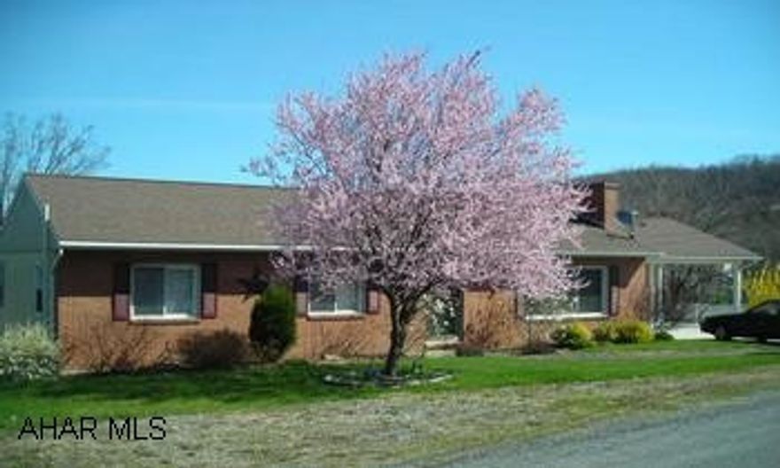 Well maintained 3 bedroom, 2 bath home with walk-out lower level and mountain views!!  2008 improvements include Burnham furnace, most interior painted, main level bath refurbished. 2007 improvement includes radon mitigation system. Well maintained 3 bedroom, 2 bath home with walk-out lower level and mountain views!!  2008 improvements include Burnham furnace, most interior painted, main level bath refurbished. 2007 improvement includes radon mitigation system.  Hardwood floors on main level;some Berber carpet on main level;stove and refrigerator convey;WBFP and blt in bookshelves in LR;attached carport for convenience and neat for entertaining;;200 amp service;HSA warranty provided.  Lower level large rec room has built-ins and also a very large workshop area.  Lower level could easily accomodate another family/mother-inlaw suite.  Kitchen has a large pantry and built-in desk!