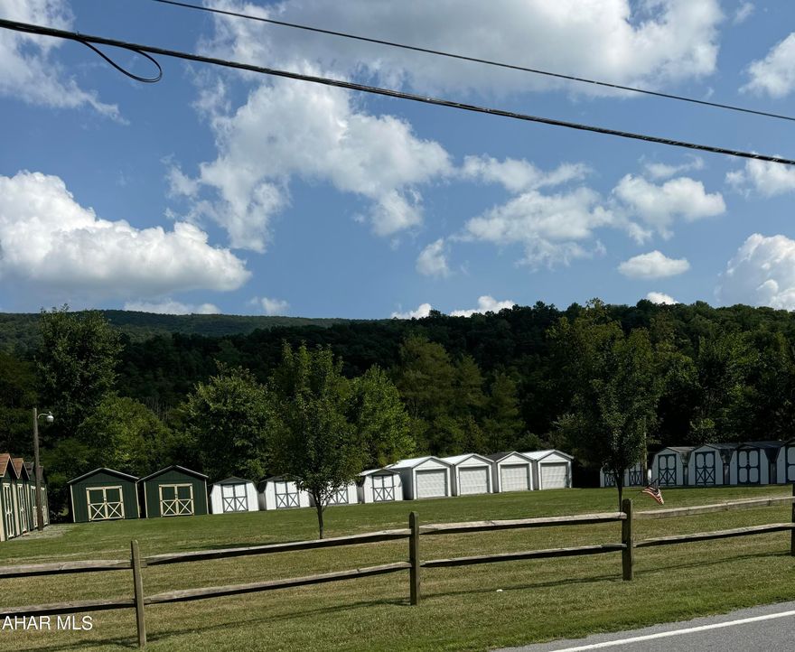 What a GREAT investment property with Fantastic multiple uses and opportunity. 20 storage shed units and all are filled with tenants. 2 dawn to dusk pole lights. Property has road frontage along Rt 96. A total of 1.184 level acres , so there is lots of room for more units to be built or placed on remaining ground. High visibility and great access for this money maker!