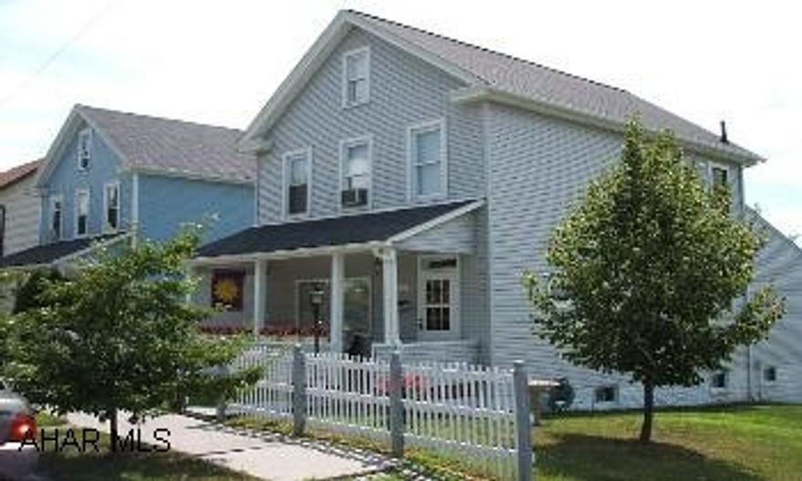 Very nice home in the Boro. Meticulously Cared for. Beautifully maintained corner property. Roof, Siding, and windows have all been replaced. Fenced in lot. Beautiful landscaping with detached workshop and screened in Detached 3 Season Room.