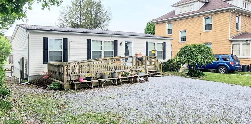 Check out this lovely ranch style double wide on a foundation. This home is a great option for anyone looking for 1st floor living. This residence features 3 Bedrooms and 2 Full Baths. Home features open floor plan and minimal inside and outside maintenance. Outside deck is perfect for entertaining in the fall and summer months. Call today for more information.