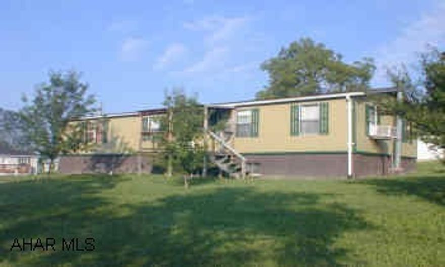 24x56 Doublewide on foundation, 120'x128' lot.