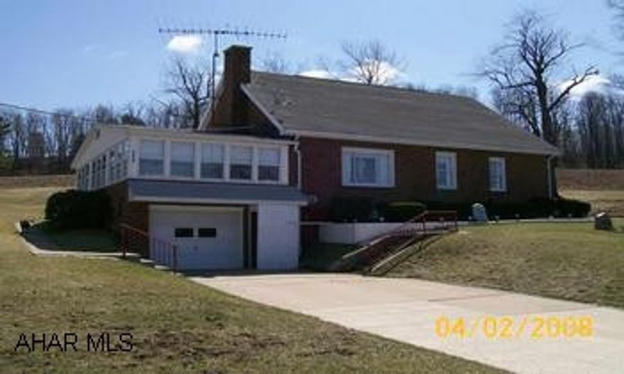 coal/forced air and electric heat, large enclosed sun porch
