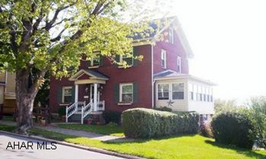 Super 2 1/2 story brick.  2 car detached garage.  Excellent condition. This fine brick home has extra large master bedroom, 15 x 22 heated and finished 3rd floor, 1.5 baths, partial finished basement, gas fireplace, sunroom, replacement windows, wondeful view from rear deck, 2 car garage and much more.