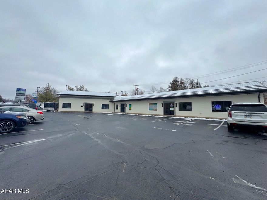 Prime professional office space available along S. Logan Blvd. Space consists of approximately 1,500 square feet with an open concept but yet offering private offices as well. The entire suite was just remodeled into modern, professional office space. Excellent visibility and exposure and a sign pole with elevated double sided signage. Updated Gas FA heat with central air-conditioning. This is an excellent opportunity for modern office space in a well maintained building with other professional offices. $1,600 per month plus utilities.