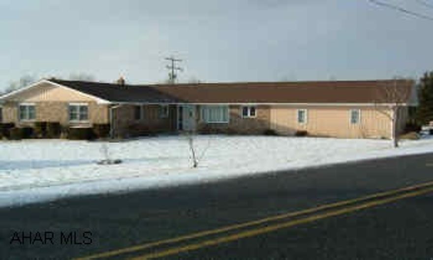 Well maintened ranch home on large corner lot. Huge finished basement with full bath and heatilator     fireplace.       Must see! Huge 14 room ranch home in excellent condition. Completely finished basement with heatilator fireplace. Property will be getting public sewer soon. Tap in fee has been paid.