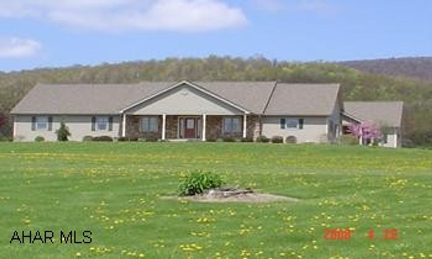 Beautiful, spacious ranch 4BR 2BA 2 car garage on 7.3 acres. Built in 2001 Business and home could be sold as 1 package. Call Kim at 814-934-7158 for details shared well & septic with business.