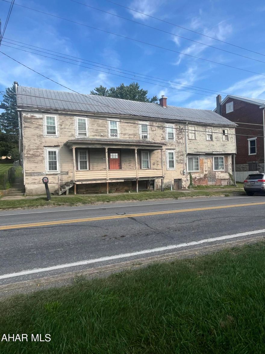 Great investment property. Home offers 3 Bedrooms, 1 Bath, office but there is an unfinished addition that could be duplexed to give a 2 bedroom apartment. Framed, electrical done, some duct work and drywall. Current wood/coal stove is not functioning and in need of repair.