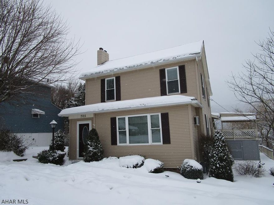 GREAT house!  Don't just drive by --- this is a MUST SEE inside home.  Great open concept feeling the moment you enter!  From the front door you'll walk right into the OPEN living room which is spacious enough, but then it flows right into the dining room; which has tray ceiling and a quaint built in corner cupboard.  It doesn't stop there....the dining room then flows into the nicely updated kitchen; which is bright and updated.   The dining room also flows into the very inviting family room which offers Cathedral ceiling and fireplace, and doors that lead to deck - to enjoy the FREE view of the Valley.  The deck is very large and the back yard also offers a large shed and spacious Greenhouse:)   This home sits on almost 1/2 acre of ground yet still in the City.  Taxes are CRAZY low!