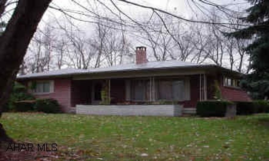 Brick ranch with nice level lot. Plenty of heating options. Hardwood floors through most of home under carpet. Shed and garage.