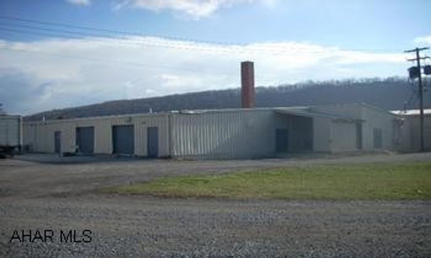 6800 sq.ft. warehouse w/ 3 offices. Tenant pays heat, electric, trash. Offices do have central air & 1/2 bath. 2 overhead doors and 1 loading dock. 11-15 parking spaces included. 450 sq ft office space w/ 2 rooms and 1/2 bath. Tenant pays only for phone and cable. Office does have C/A.