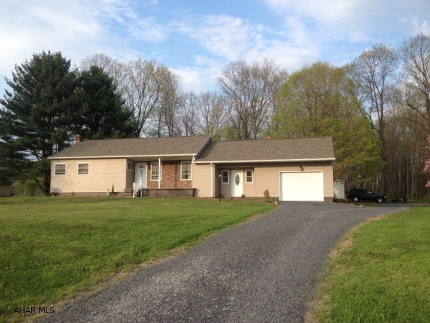 Charming 3-BR home with updated kitchen and bath. Features large rooms, hardwood floors, new heat pump, central air, new siding, windows, roof. 1-Car attached garage, and 2-Car detached garage.