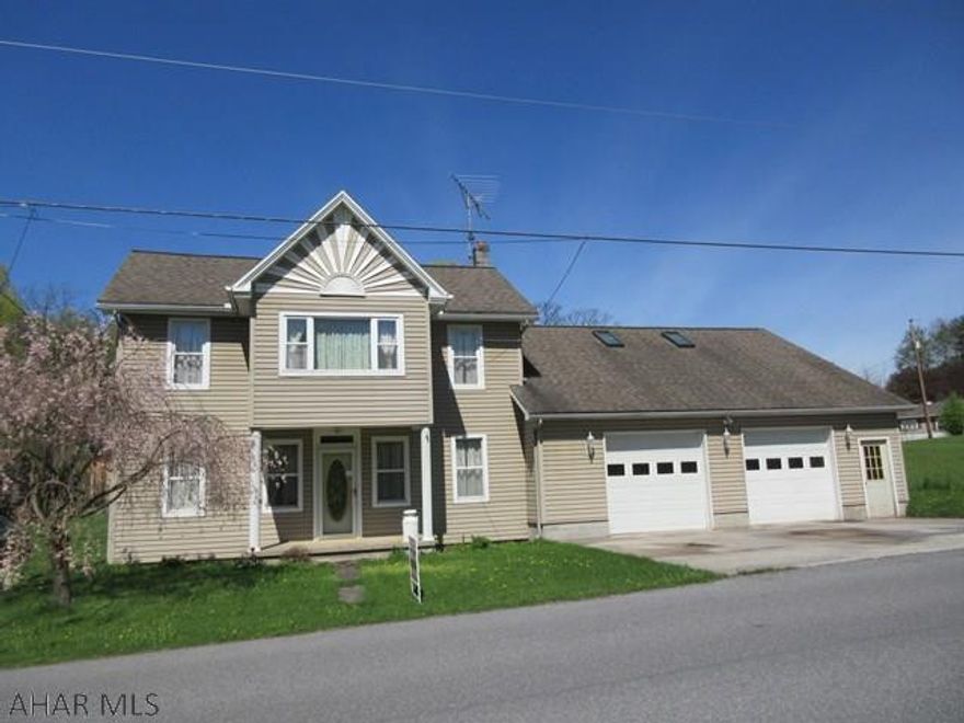 Large 2 Story vinyl home with loads of space for everyone. Located only 6  miles from Blue Knob Ski Resort and 1 mile from Blue Knob State Park w/ public pool, trails, etc.  Features large living room with gas FP, formal dining room, spacious eat-in kitchen with dining and laundry areas. Four large bedrooms with all new carpeting! Sunroom plus large bonus room above garage with separate entryway. HUGE over-sized attached 2 car garage, large covered rear deck and 2 storage sheds. 3 zone hot water heat, large attic with walk-up stairs for ample storage.