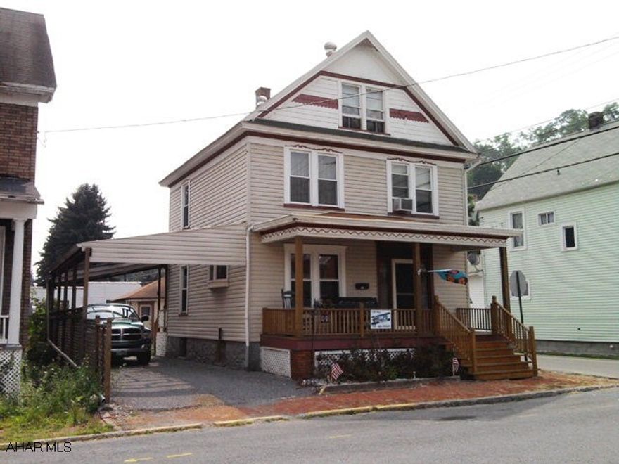 Good 2 1/2 story, 3 bedroom home with hardwood floors and natural woodwork. Thermopane windows. Corner lot. 1 car detached garage, carport.