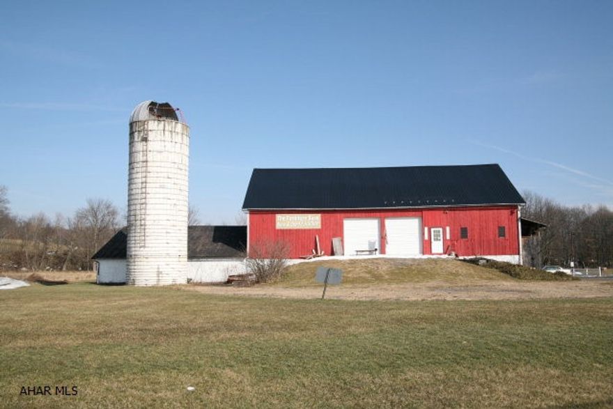 Extensive commercial property with almost 20,000 square feet of selling/storage space available located on 4.332 acres of prime roadside property. The current turnkey business can also be acquired through the seller if desired.